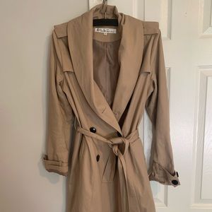 Hardly worn Kenneth Cole double buttoned trench coat. Nude color